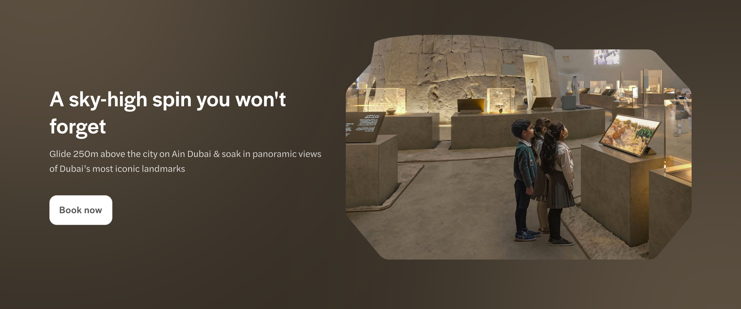 Kids observing exhibits at Zayed National Museum.